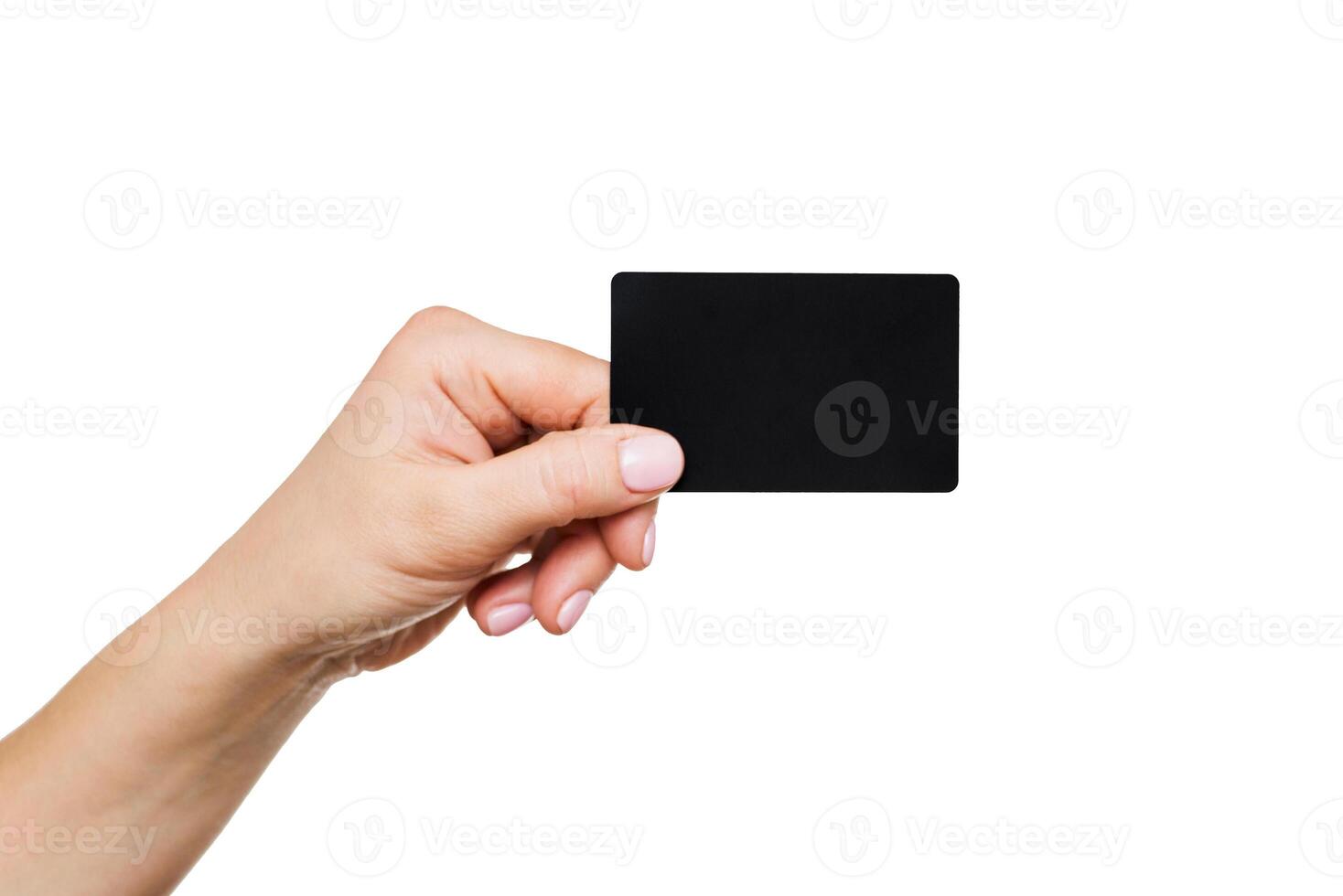 Close up of womans hand holding blank black card photo