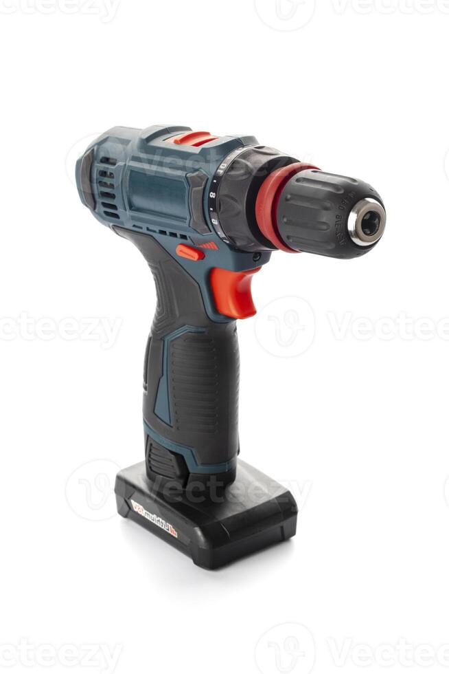 Cordless drill screwdriver isolated on white background. Professional tool photo