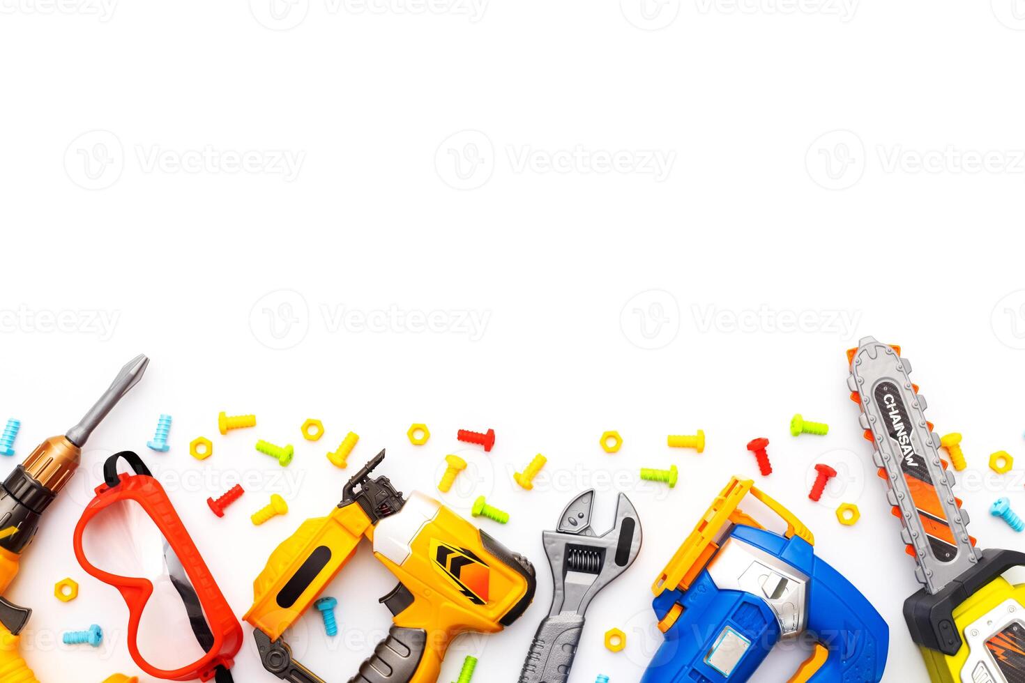 Colorful kids toy tools on white background. Flat lay. Copy space for text photo