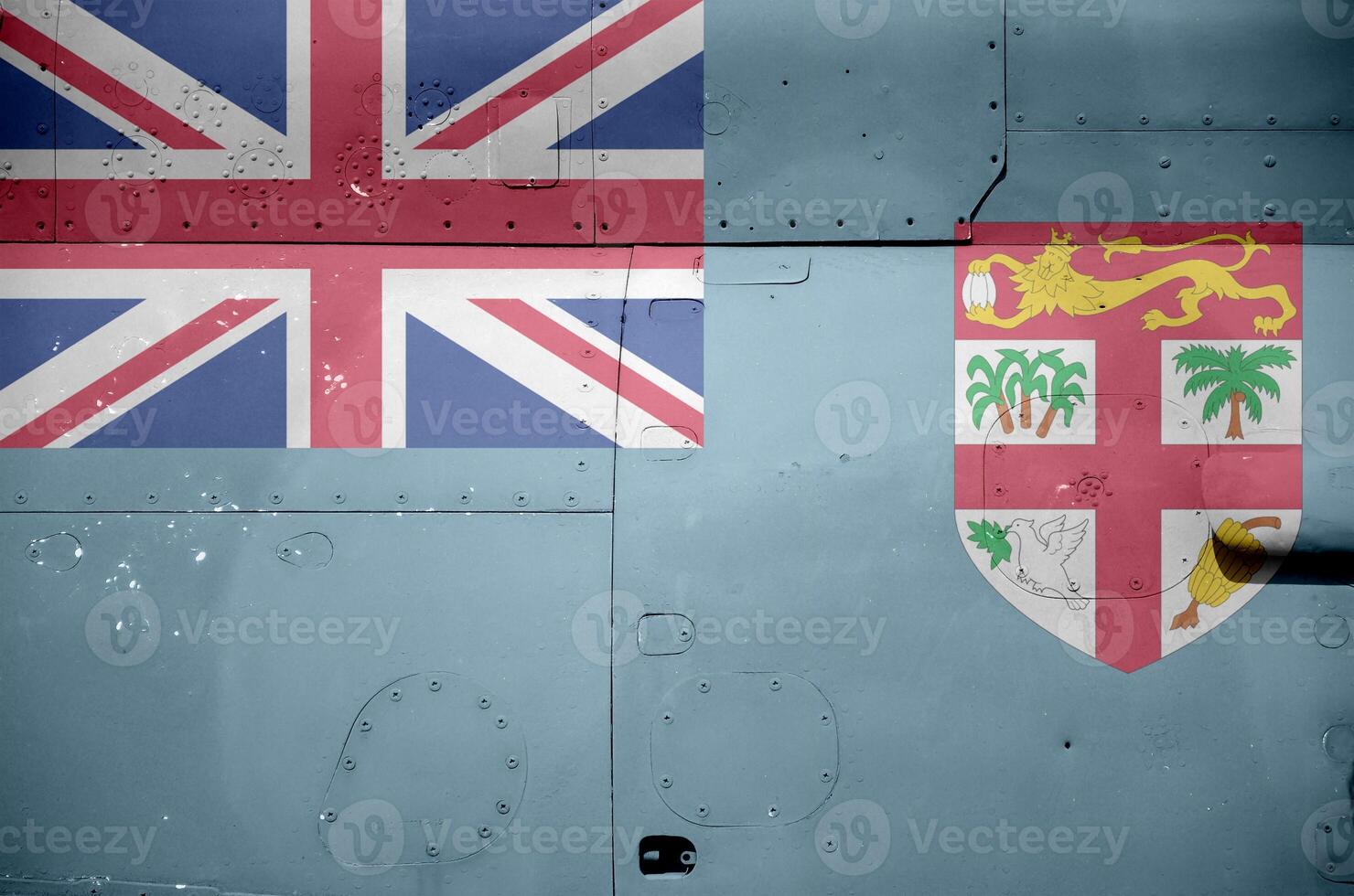 Fiji flag depicted on side part of military armored helicopter closeup. Army forces aircraft conceptual background photo