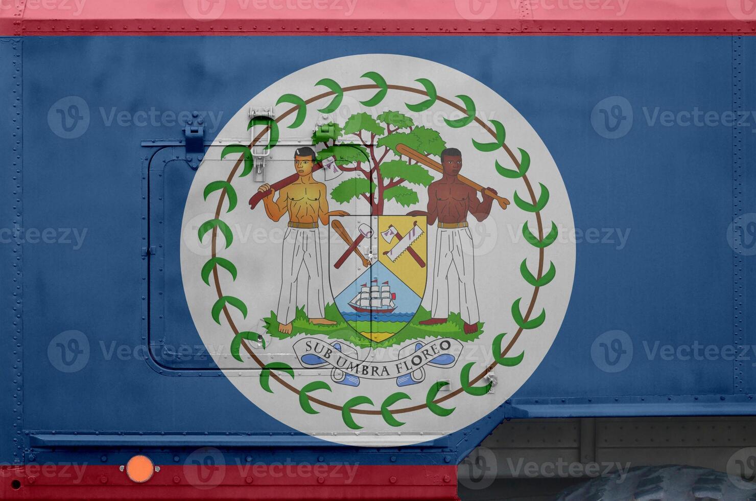 Belize flag depicted on side part of military armored truck closeup. Army forces conceptual background photo