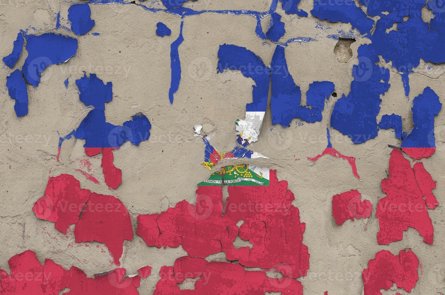Haiti flag depicted in paint colors on old obsolete messy concrete wall closeup. Textured banner on rough background photo