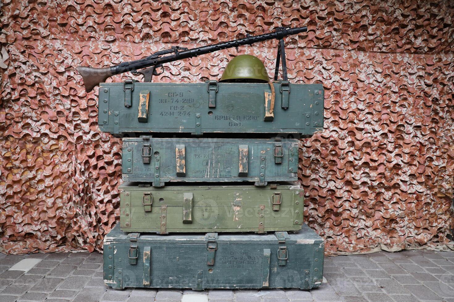 Soviet army ammunition stack of green crates with russian names of ammo type and category photo