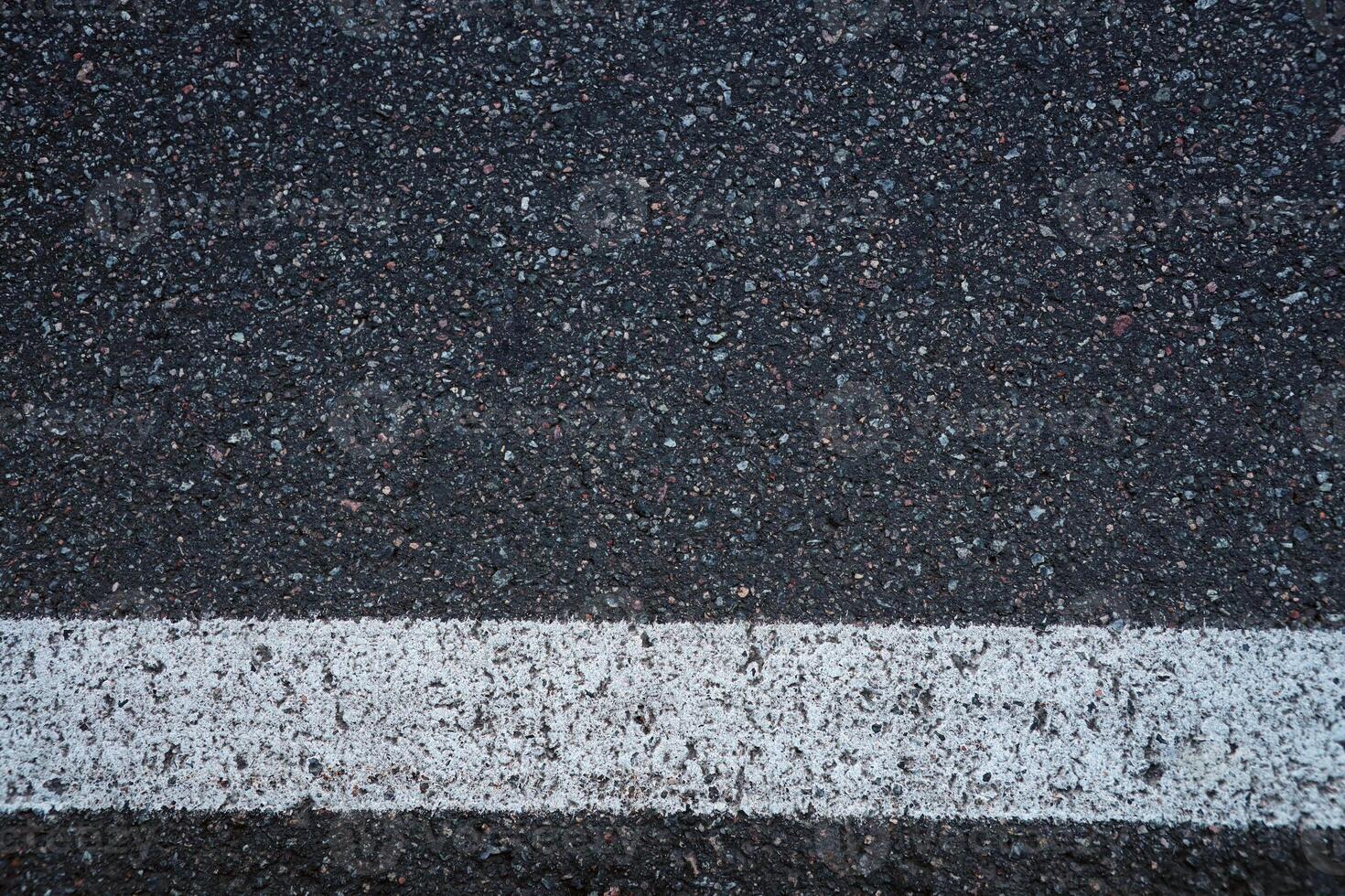 Surface grunge rough of asphalt. Tarmac dark grey grainy road. Texture Background Top view photo