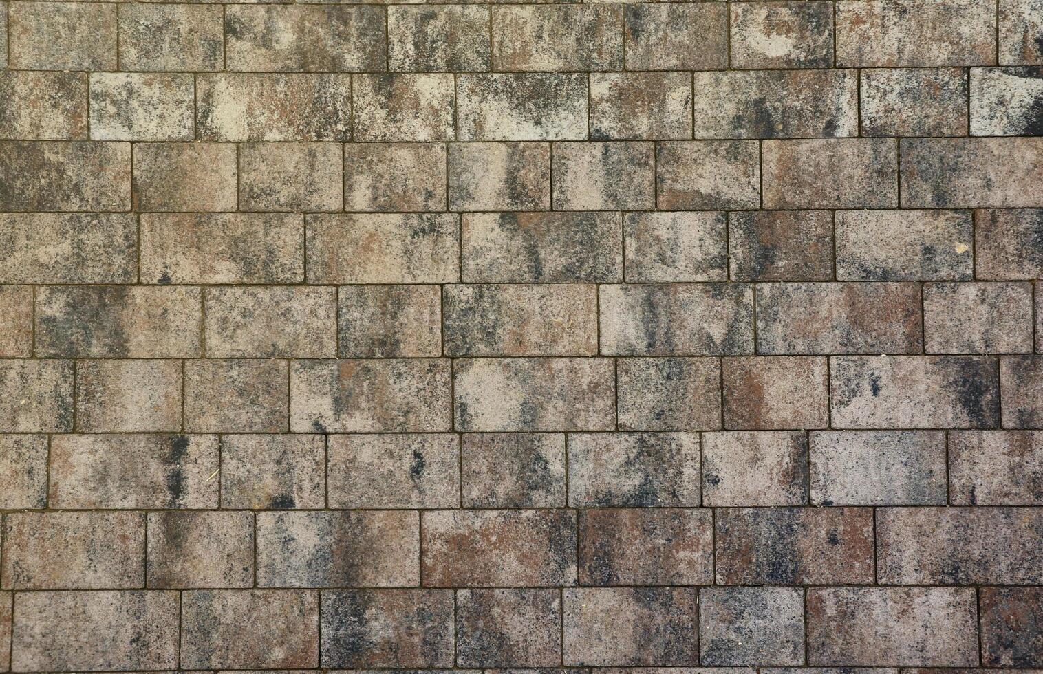 Marble tiles on brick floor or wall background with grey and brown colors front or top view photo