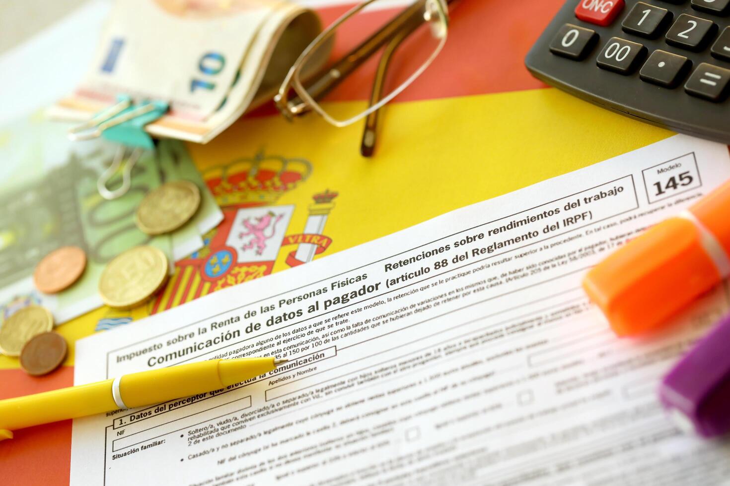 KYIV, UKRAINE - MAY 4, 2022 Modelo 145 spanish tax form dedicated to personal income tax IRPF photo