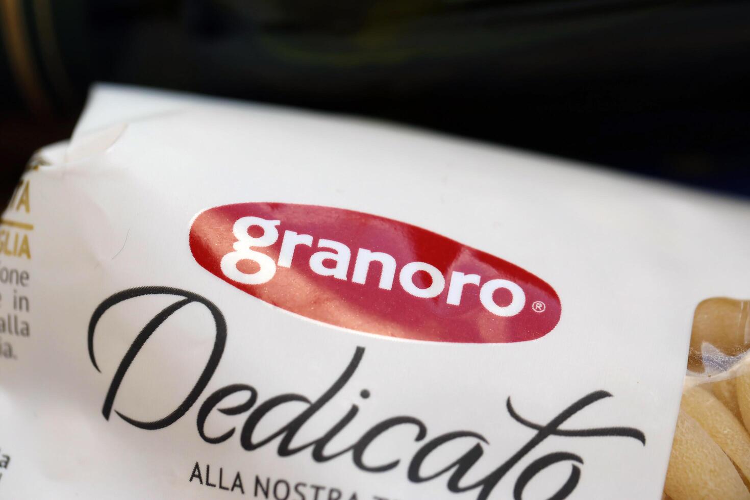 KYIV, UKRAINE - 4 MAY, 2023 Granoro logo on cardboard pack of italian food photo