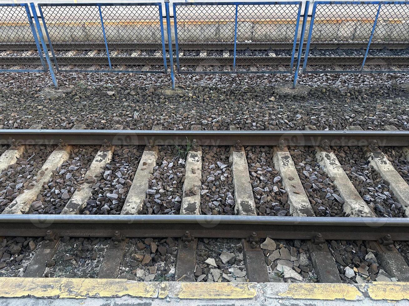 Rails and sleepers. Road, mode of electrical transport. photo