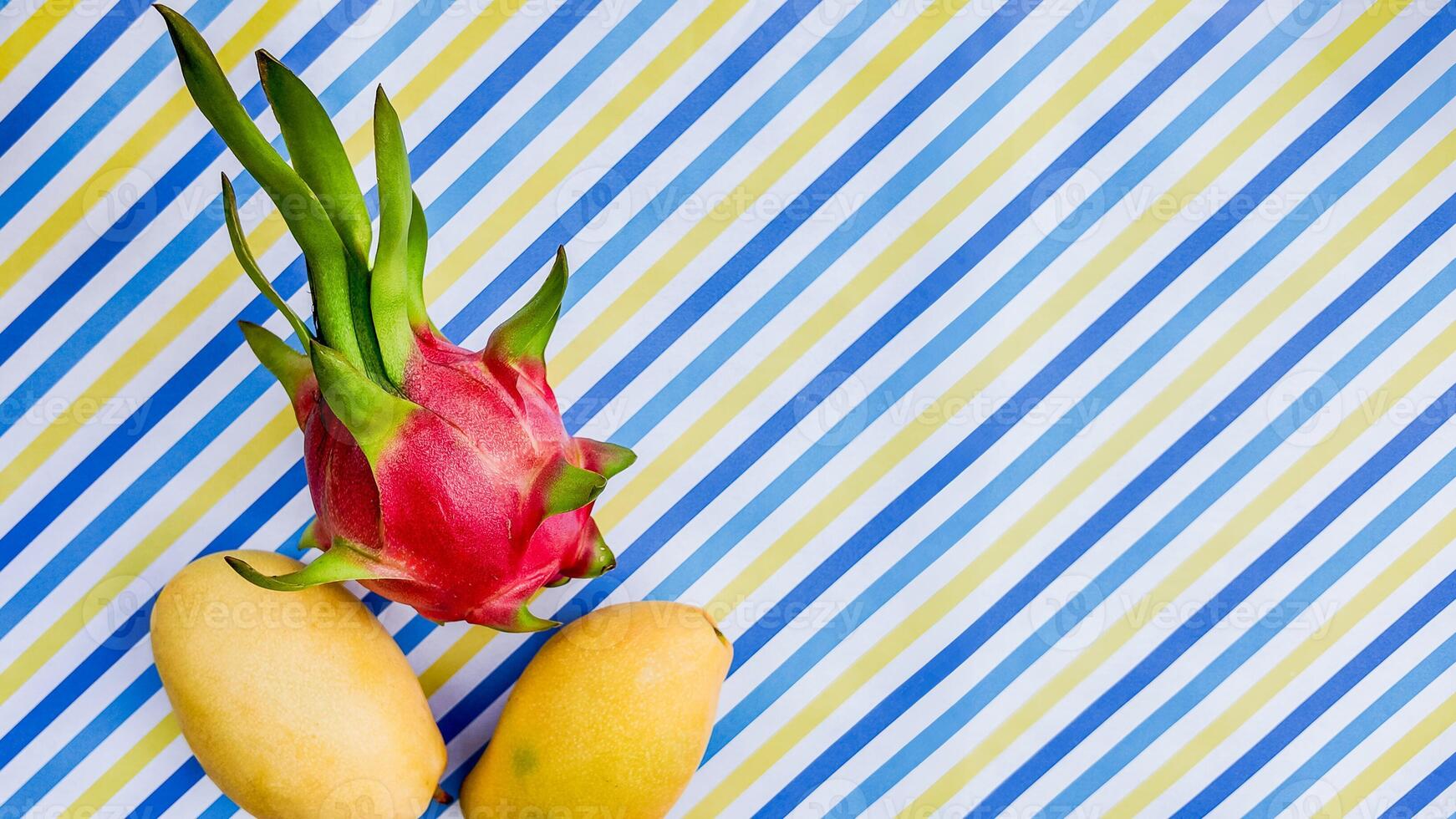 Tropical Dragon Fruit  Mangoes background photo