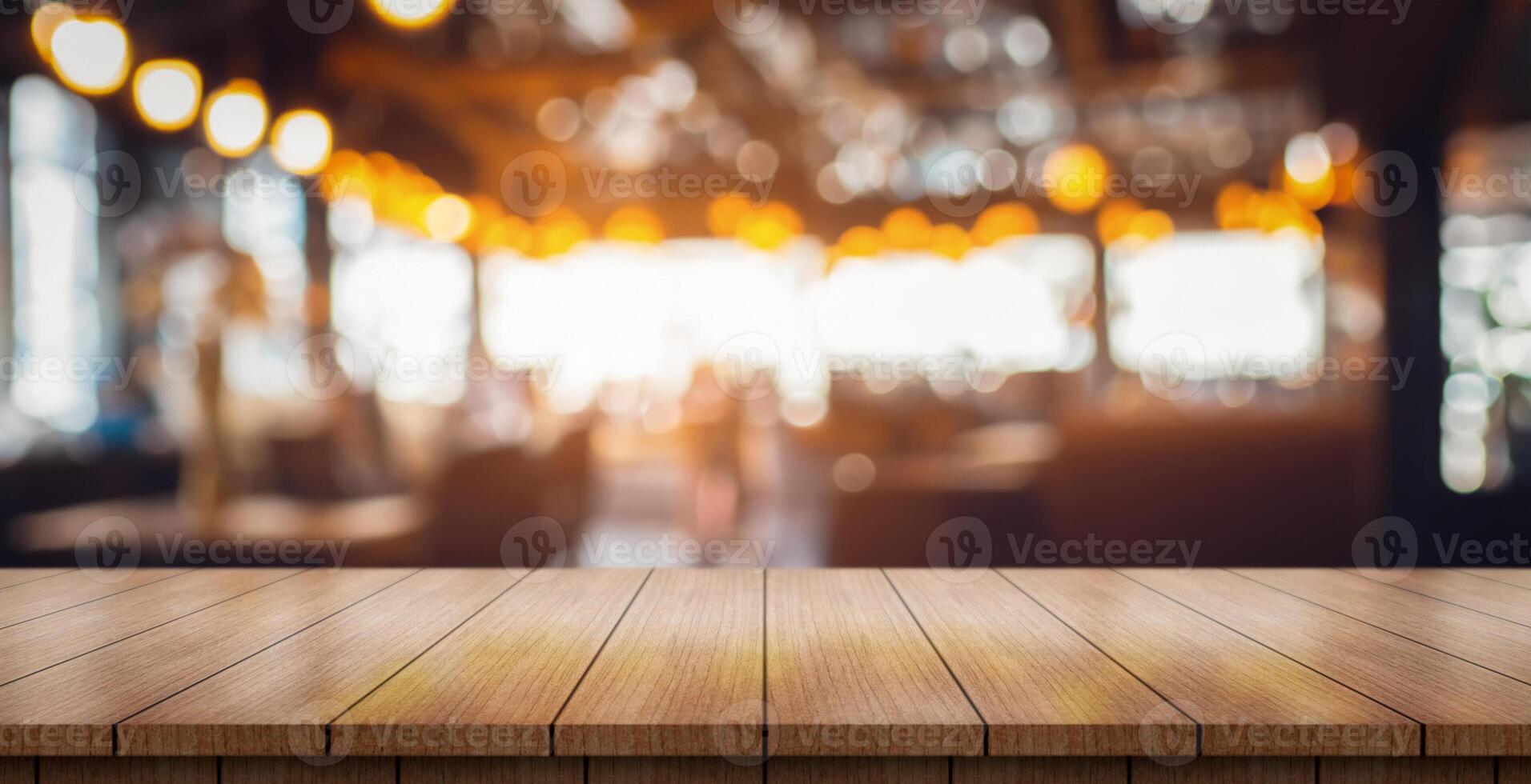 ai generado vacío de madera mesa parte superior con luces bokeh en difuminar restaurante antecedentes. foto