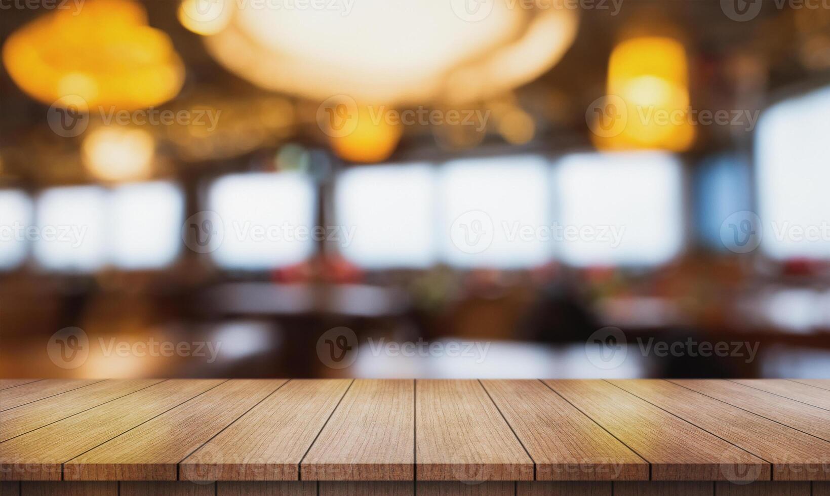 ai generado vacío de madera mesa parte superior con luces bokeh en difuminar restaurante antecedentes. foto