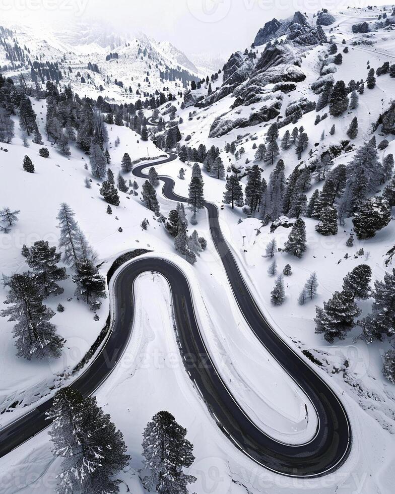 AI generated Aerial view of winding road in mountains with snow photo