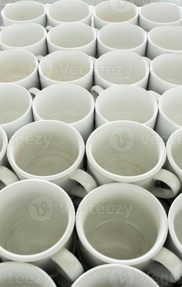 Row of coffee cups ready to use photo