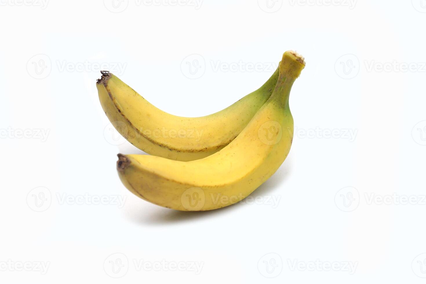 aislado Cavendish bananas en blanco antecedentes. eso es un Fruta con bueno gusto. eso tiene un delicioso aroma. el pelar es delgado, no pegajoso. el piel color de bananas vueltas dorado amarillo cuando maduro. foto