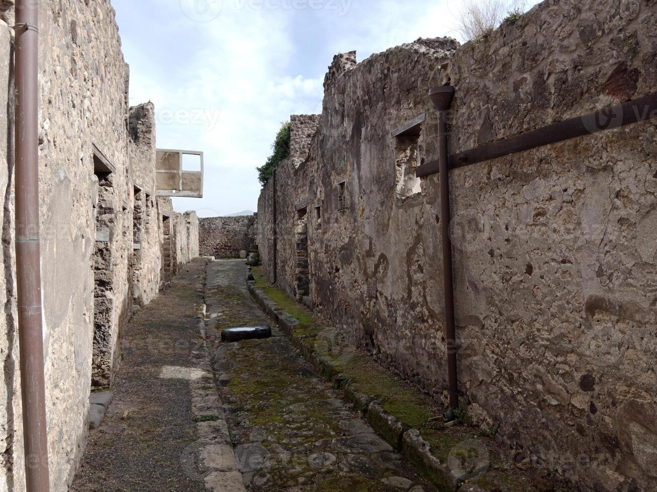Pompeii, the ancient Roman city buried by the eruption of Mount Vesuvius, stands as a UNESCO World Heritage Site, offering a unique glimpse into daily life during the Roman Empire. photo