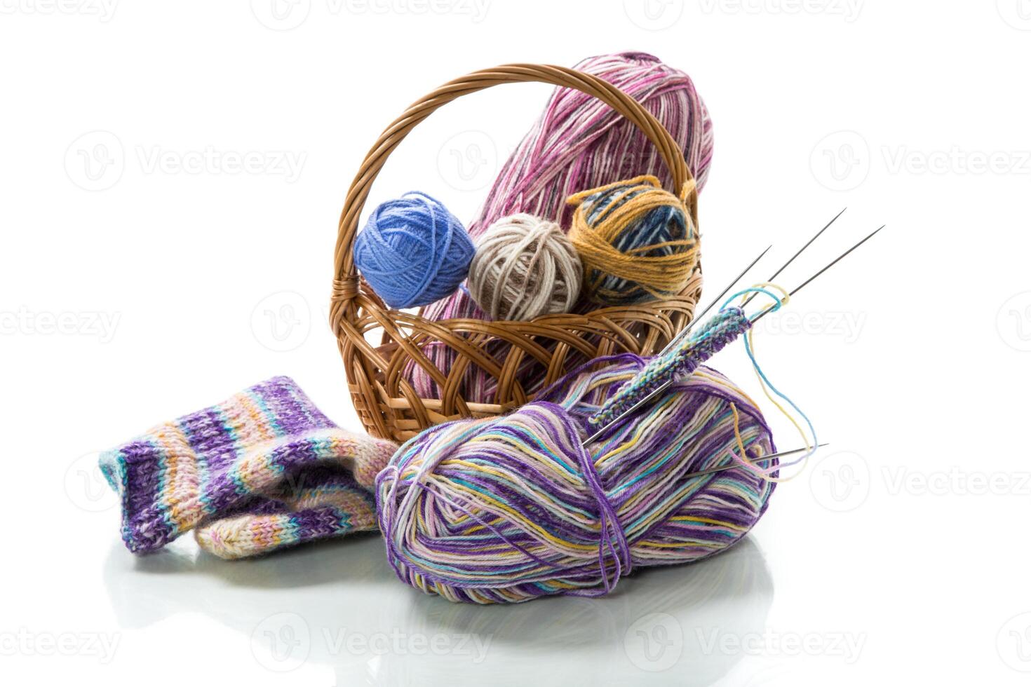 Colored threads, knitting needles and other items for hand knitting photo