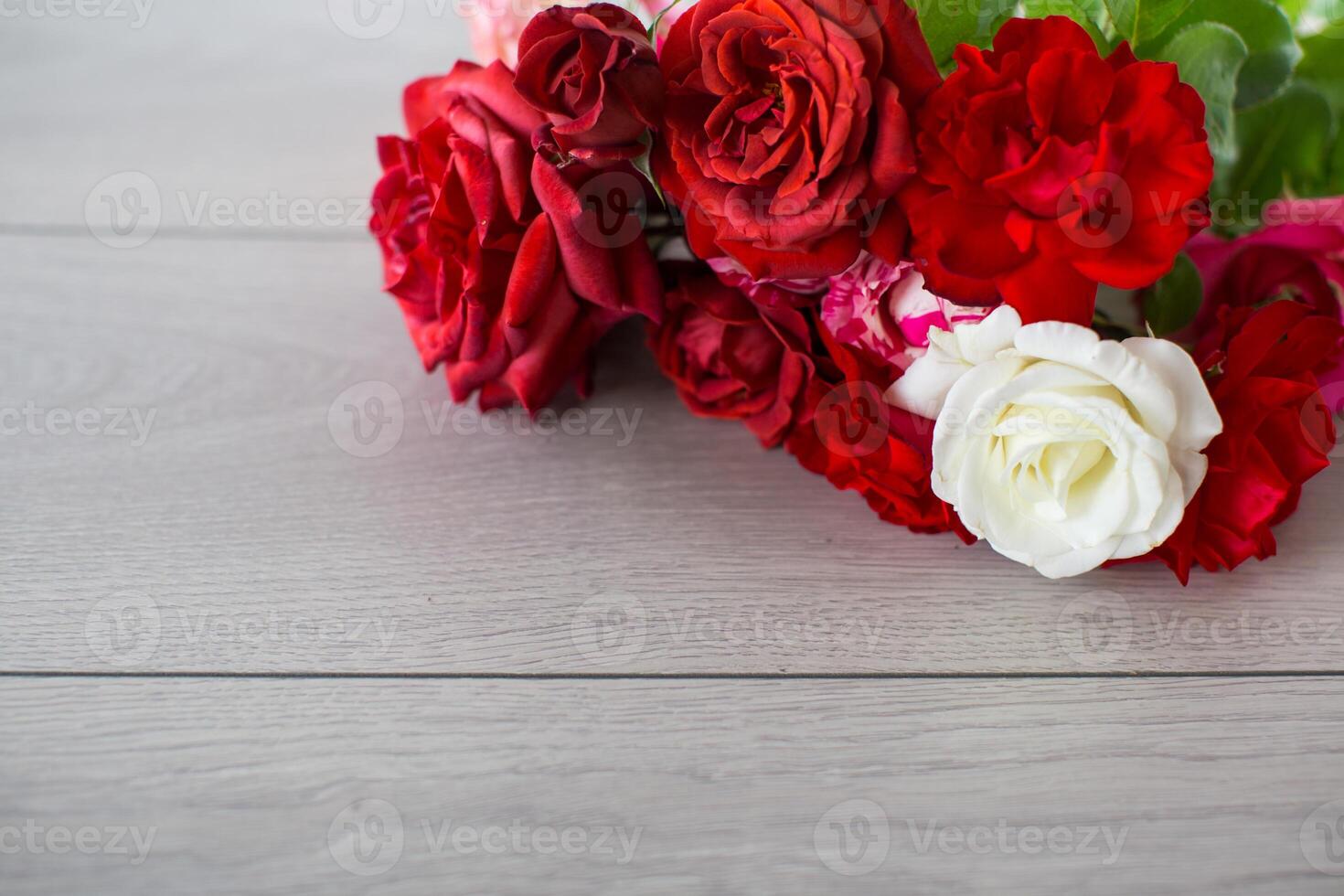 Floral background of pink, red and other roses photo