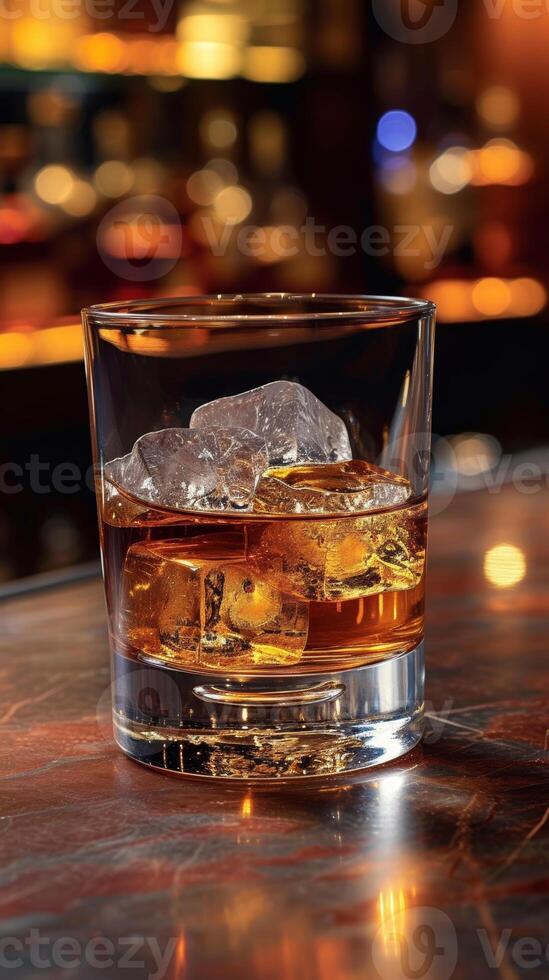 AI generated Glass of whiskey with ice cubes on the wooden bar counter photo