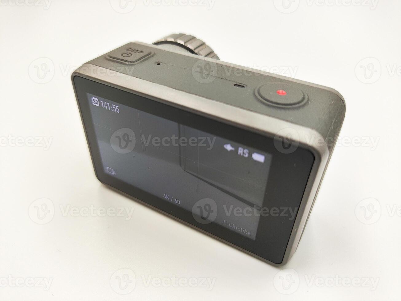 High Performance Action Camera on White Background Versatile Device for Capturing Dynamic Shots in Any Environment photo