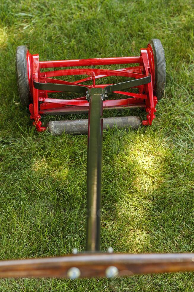 a full view of a reel lawnmower after the restoration process was completed photo