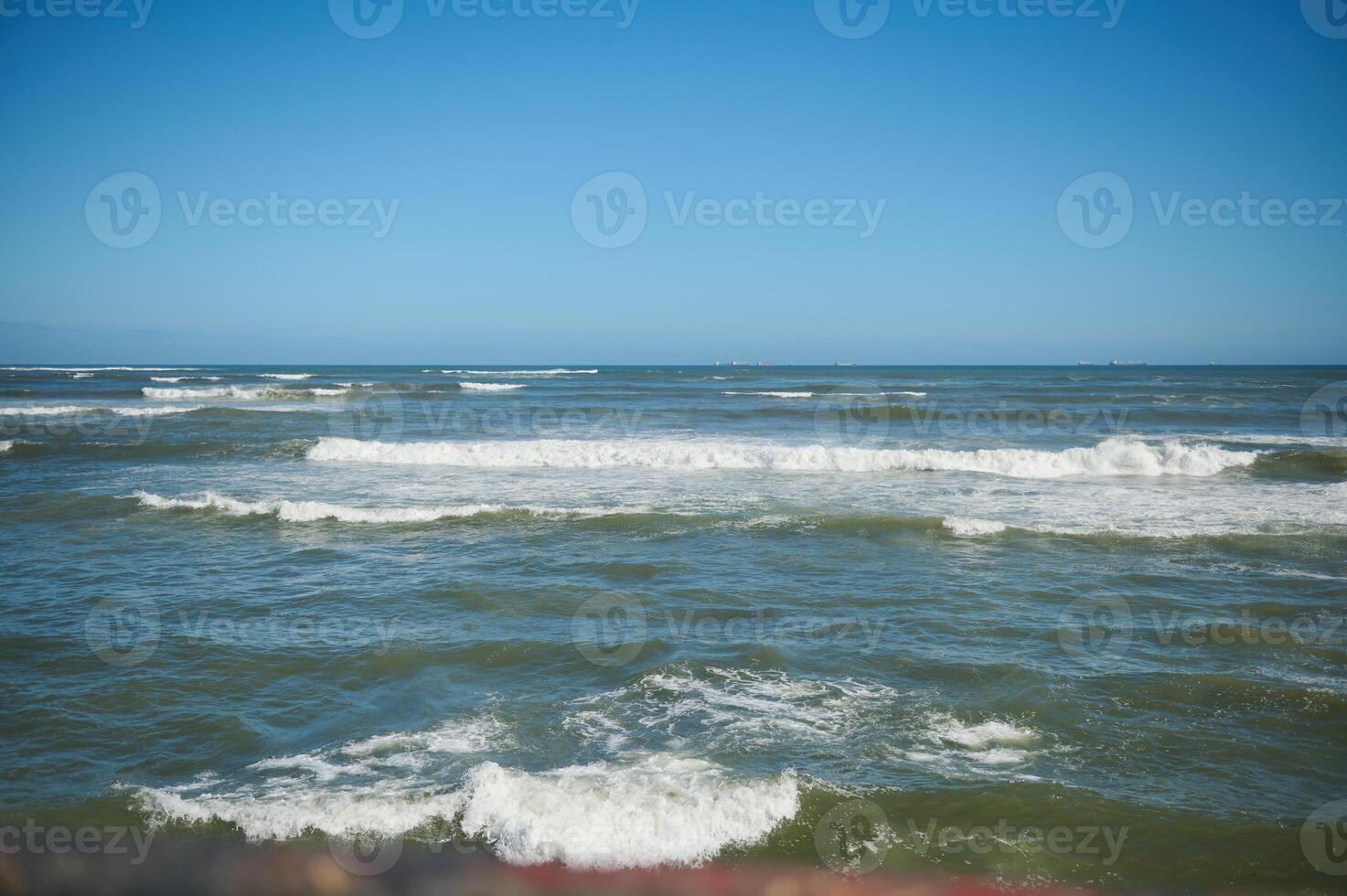 View of sea waves pounding on the headland. Atlantic ocean background photo