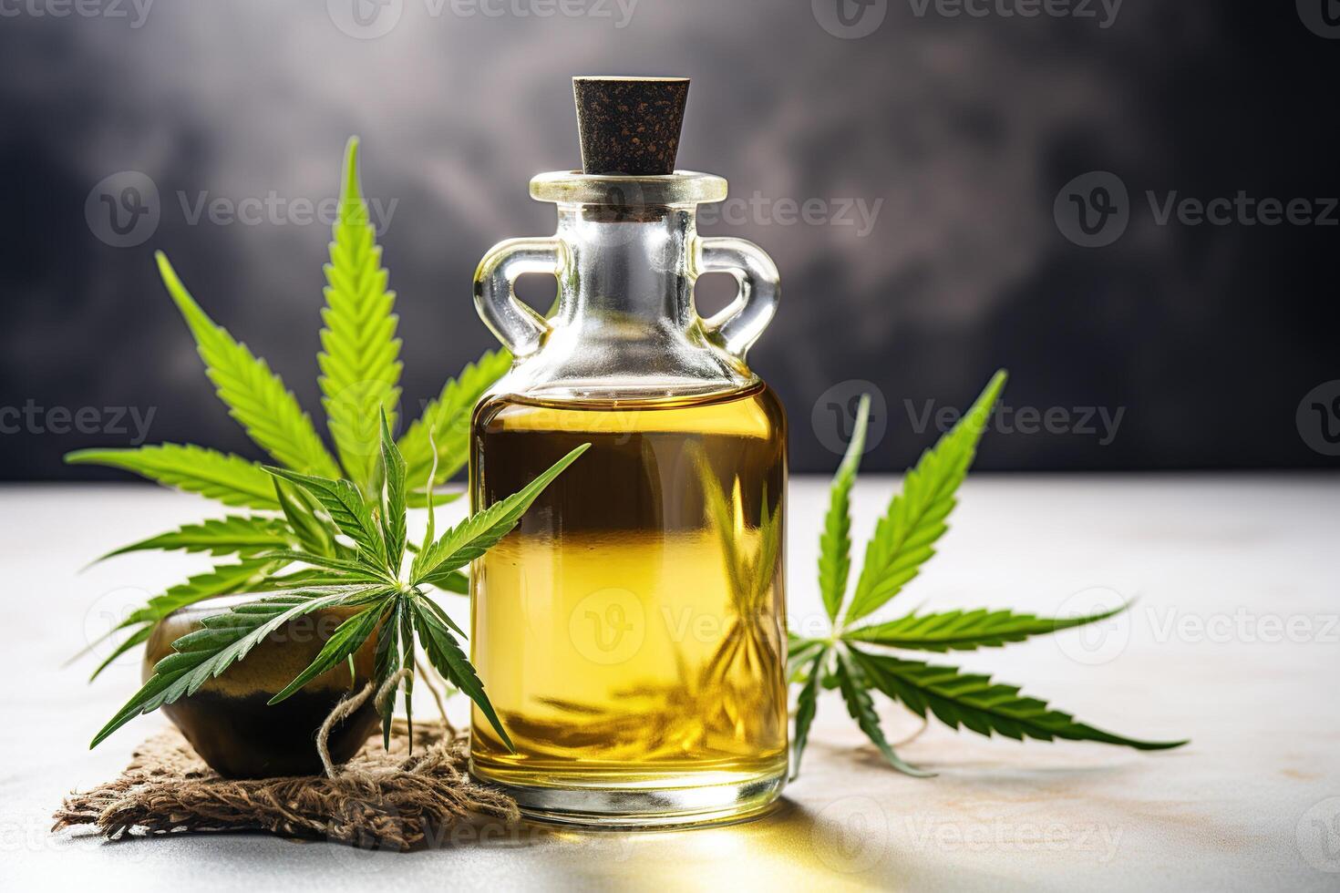 AI generated Glass bottle of hemp oil, small bowl and green hemp leaves on a light table on a dark background with smoke photo