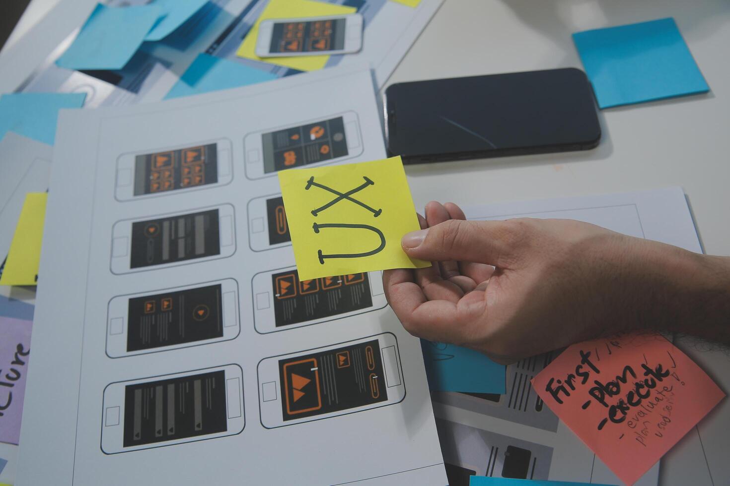 ux Graphic designer creative sketch planning application process development prototype wireframe for web mobile phone . User experience concept. photo