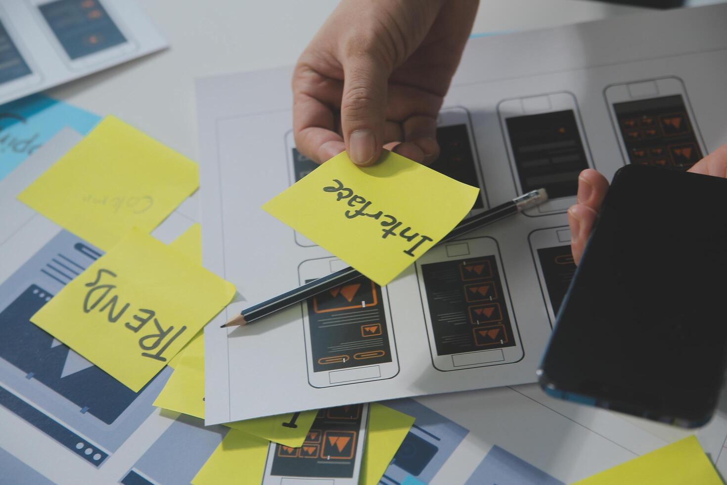 ux Graphic designer creative sketch planning application process development prototype wireframe for web mobile phone . User experience concept. photo
