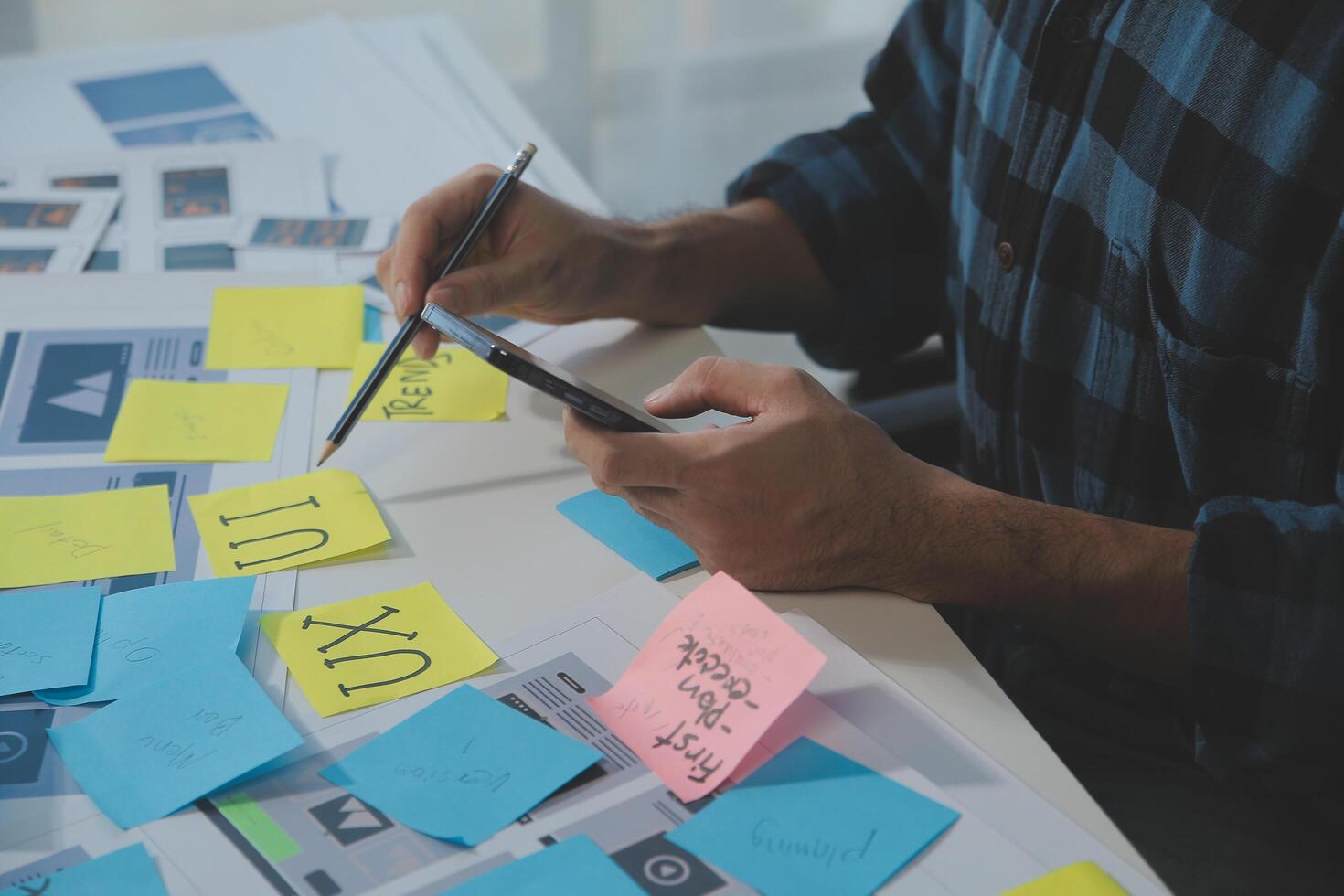 ux Graphic designer creative sketch planning application process development prototype wireframe for web mobile phone . User experience concept. photo