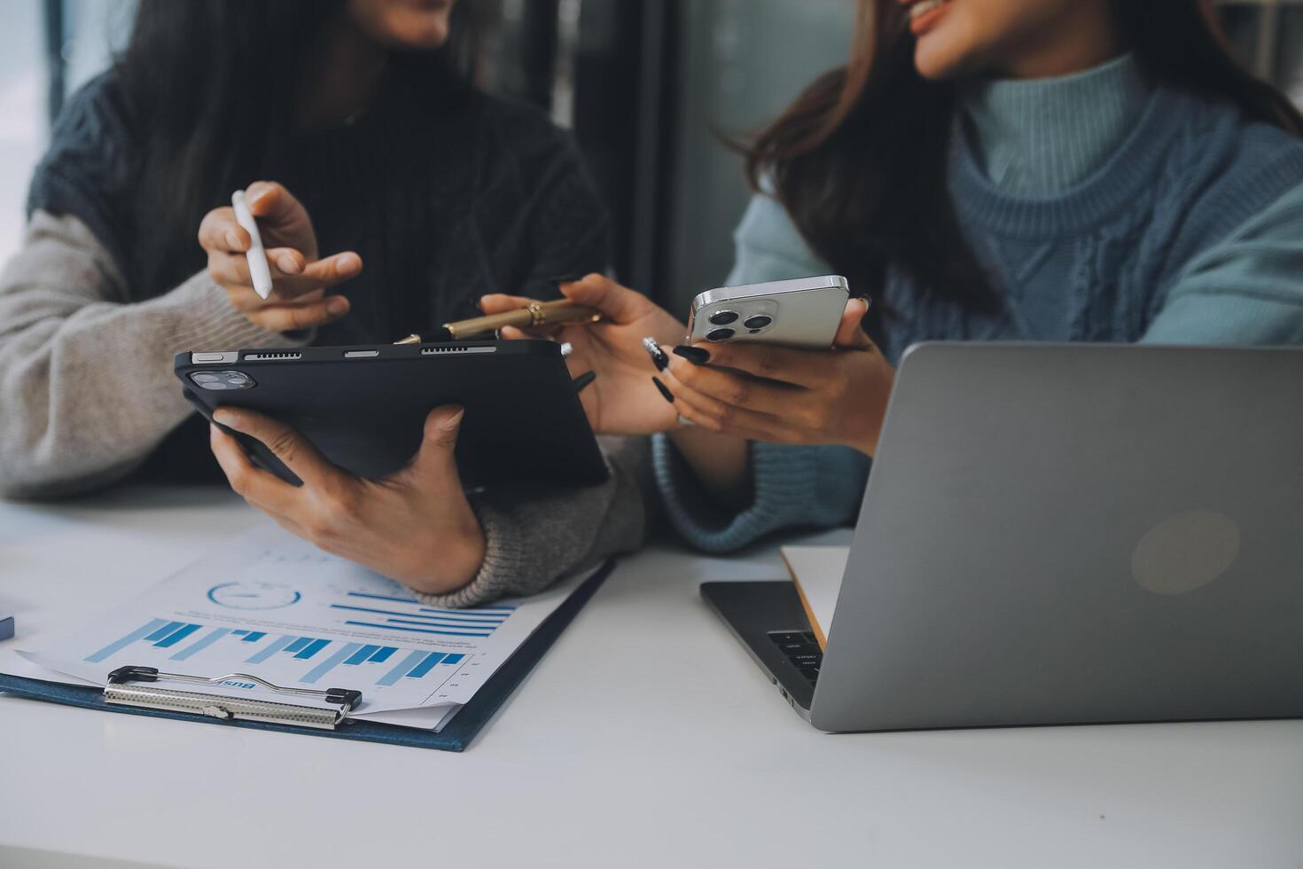 Co working conference, Business team meeting present, investor colleagues discussing new plan financial graph data on office table with laptop and digital tablet, Finance, accounting, investment. photo