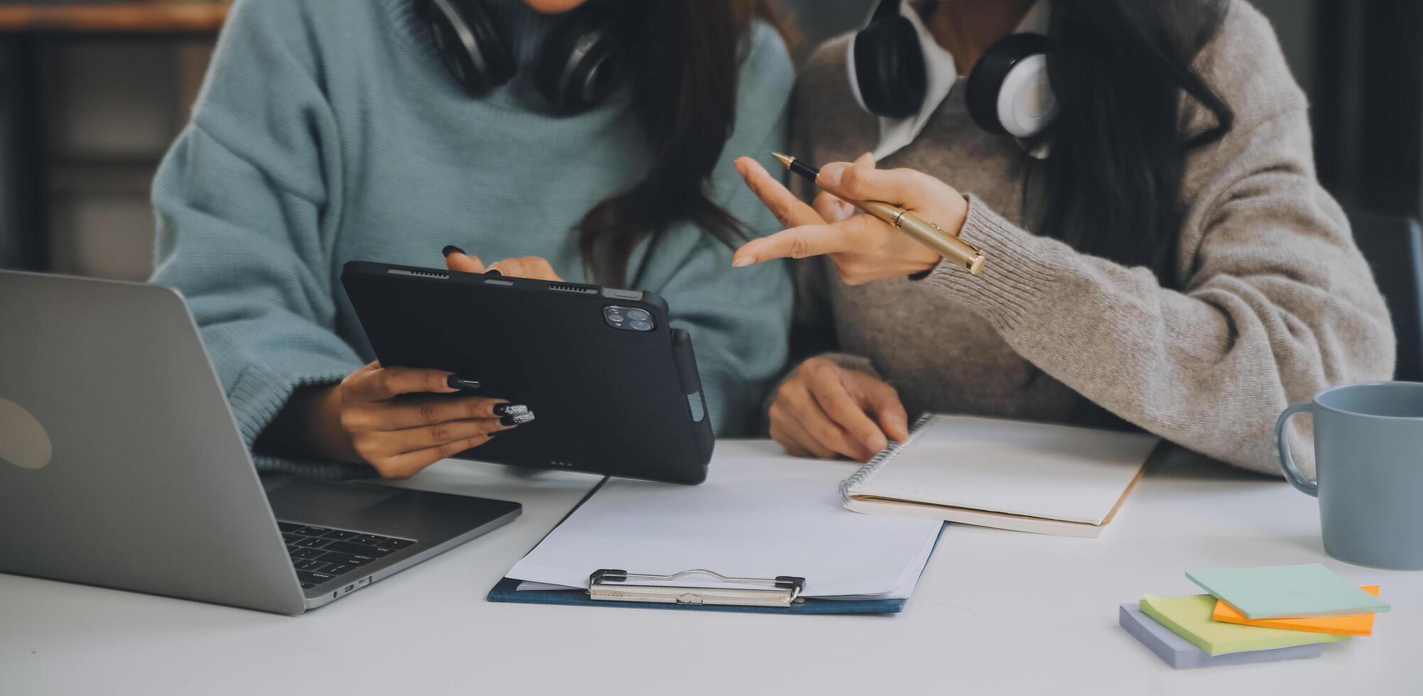 Co working conference, Business team meeting present, investor colleagues discussing new plan financial graph data on office table with laptop and digital tablet, Finance, accounting, investment. photo