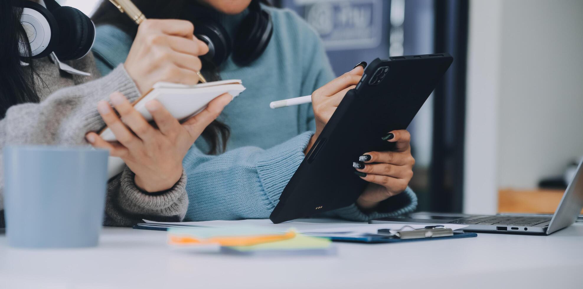 Co working conference, Business team meeting present, investor colleagues discussing new plan financial graph data on office table with laptop and digital tablet, Finance, accounting, investment. photo