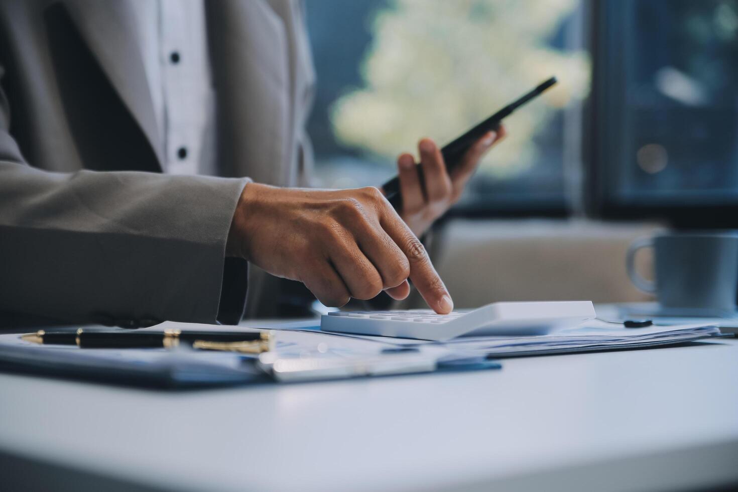 Office, tablet and business man happy for positive financial savings, finance budget report or administration feedback. Growth analytics, data analysis review and person smile for research statistics photo