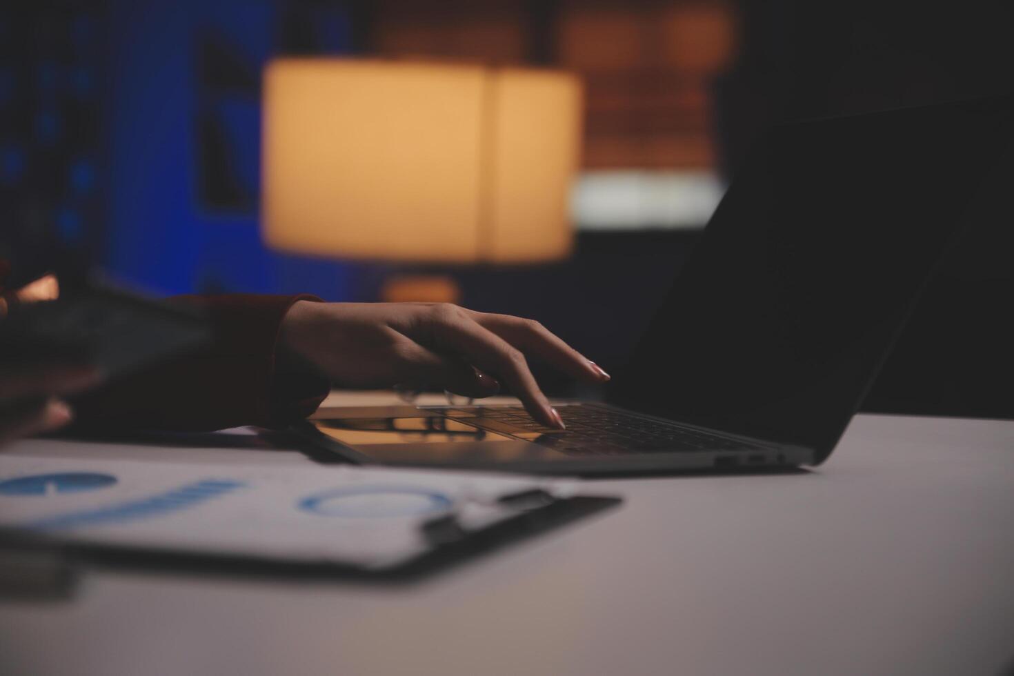 Business woman using calculator for do math finance on wooden desk in office and business working background, tax, accounting, statistics and analytic research concept photo