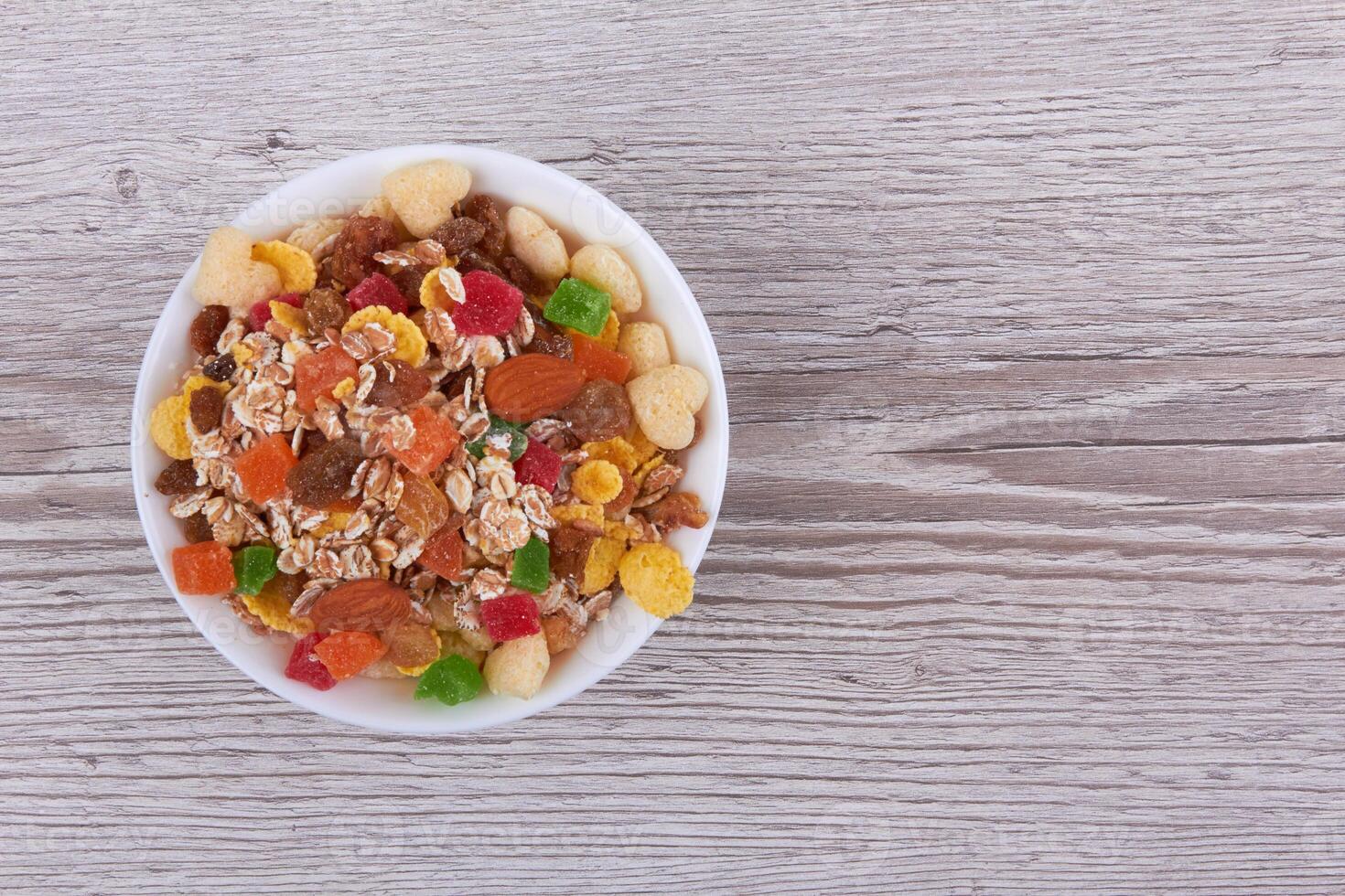 Muesli in bowl photo