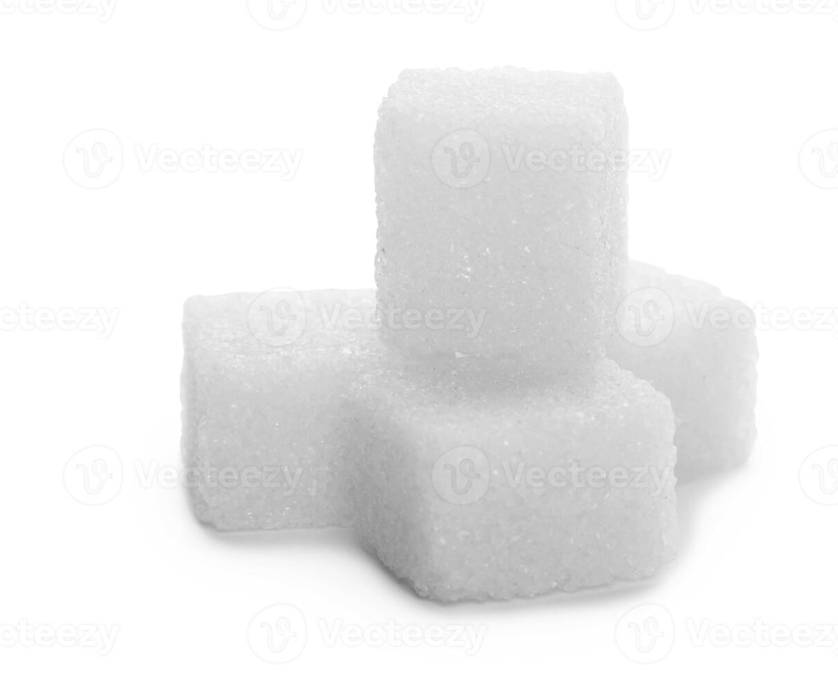 Sugar cubes on white photo