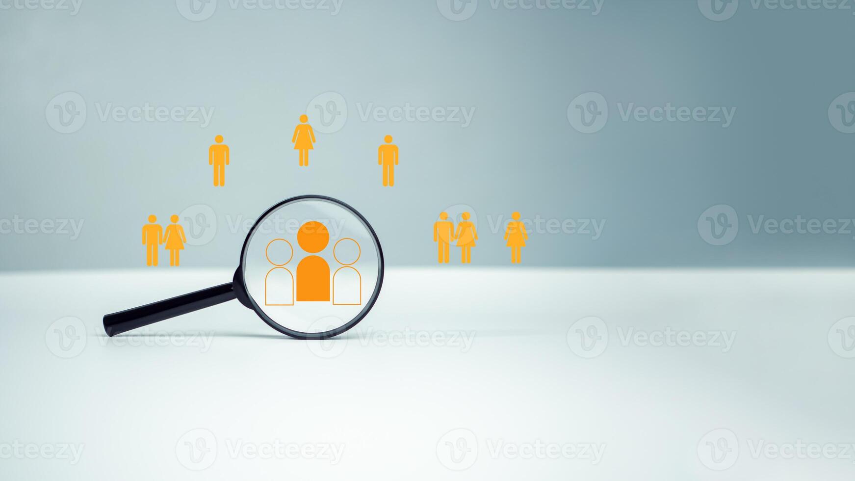 Customer group icons in a magnifying glass placed on a white background represent the selection of business goals, target customers, Marketing plans and strategies, customer-centric strategies. photo