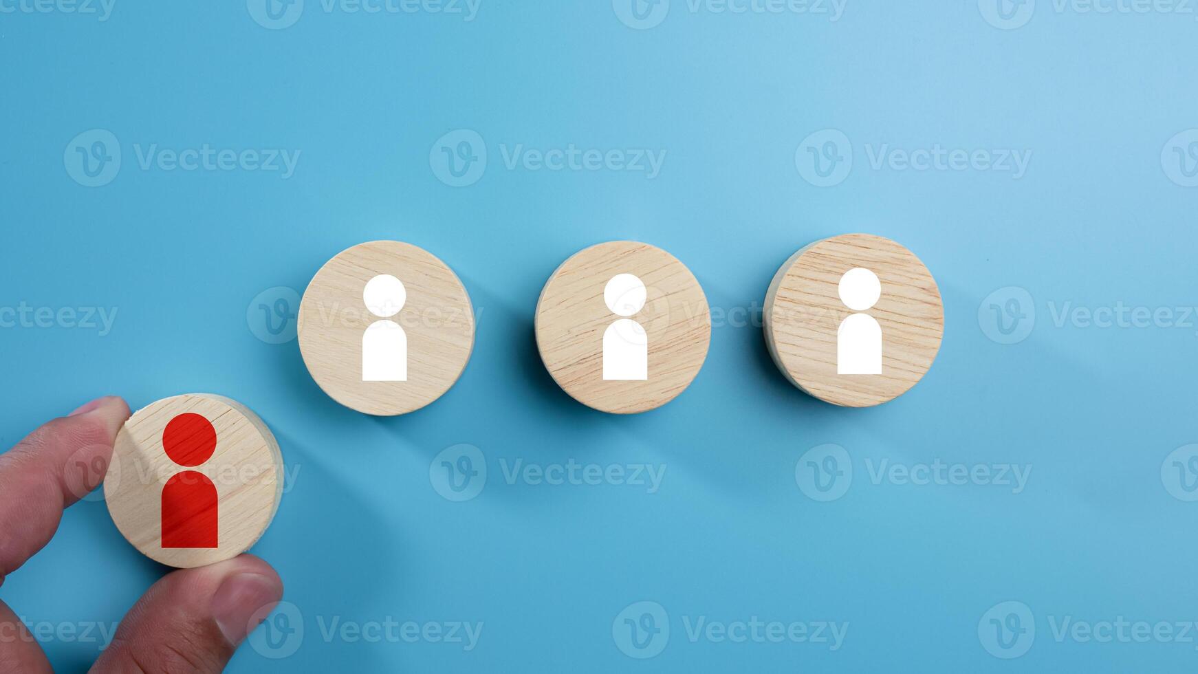 Human Resource Management, Business hiring and recruitment selection, Human Resource Management. Focus human icon on circular wooden board, Choice of employee leader crowd, leadership concept. photo