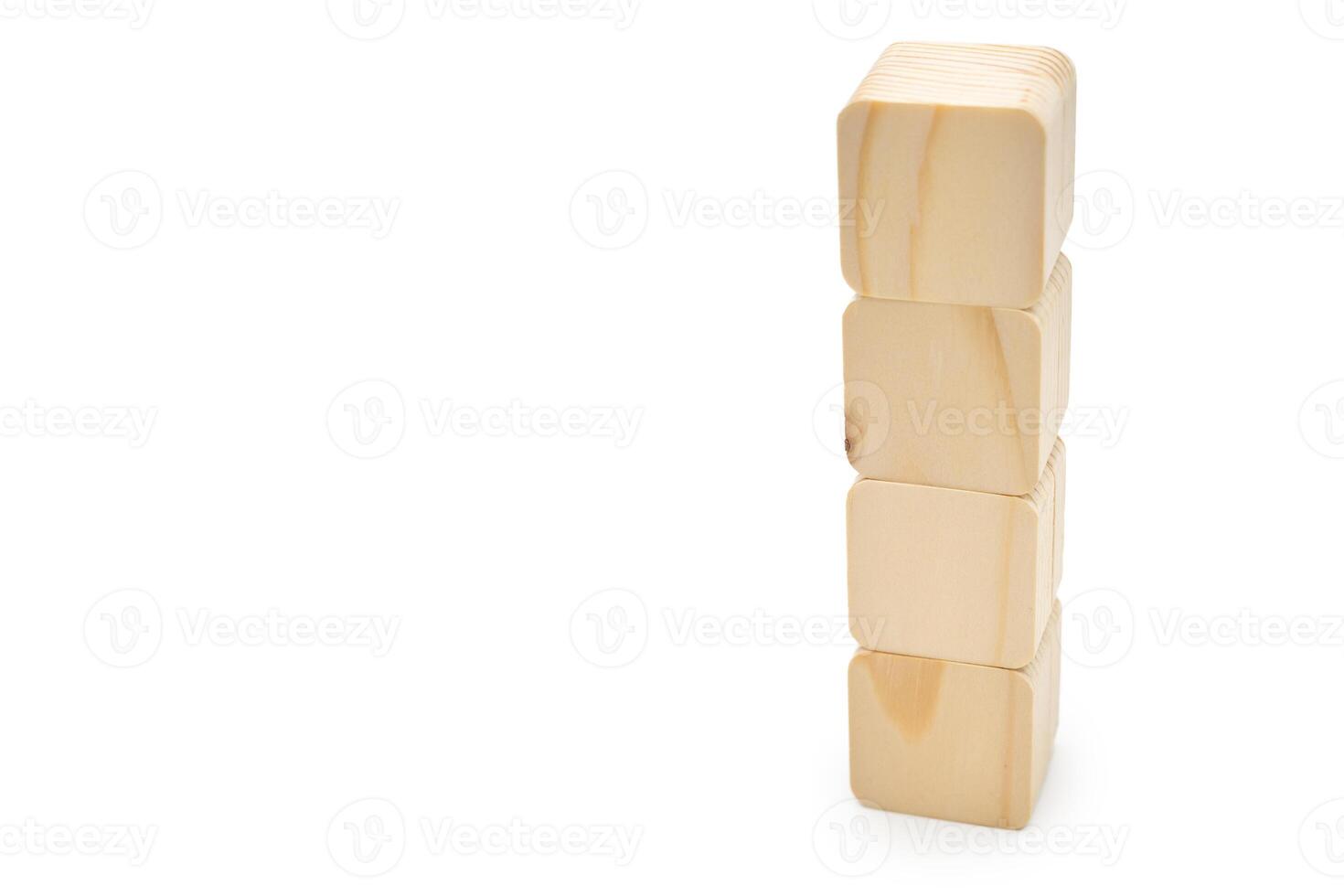 Four Wooden cubes in row. It is isolated on a white background with clipping path. Wooden toy blocks. empty copy space for message word. photo