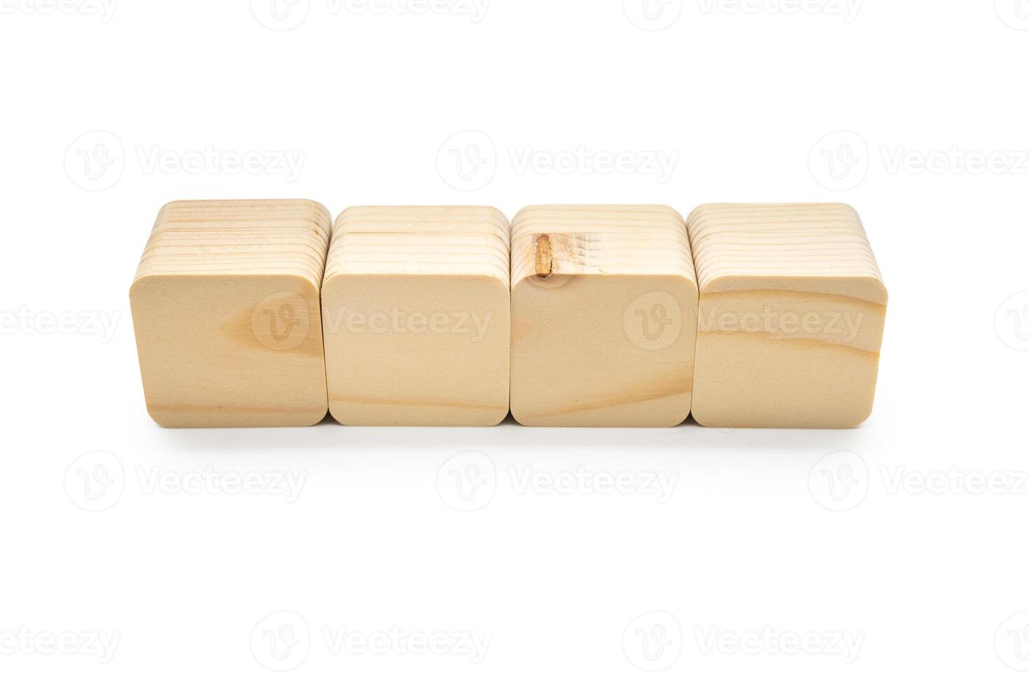 Four Wooden cubes in row. It is isolated on a white background with clipping path. Wooden toy blocks. empty copy space for message word. photo