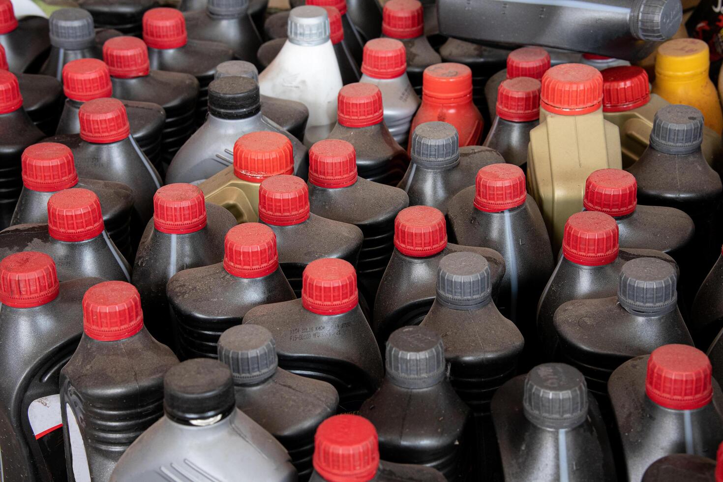 Motor oil bottles  from a car repair shop. Car service or maintenance and condition checks. photo