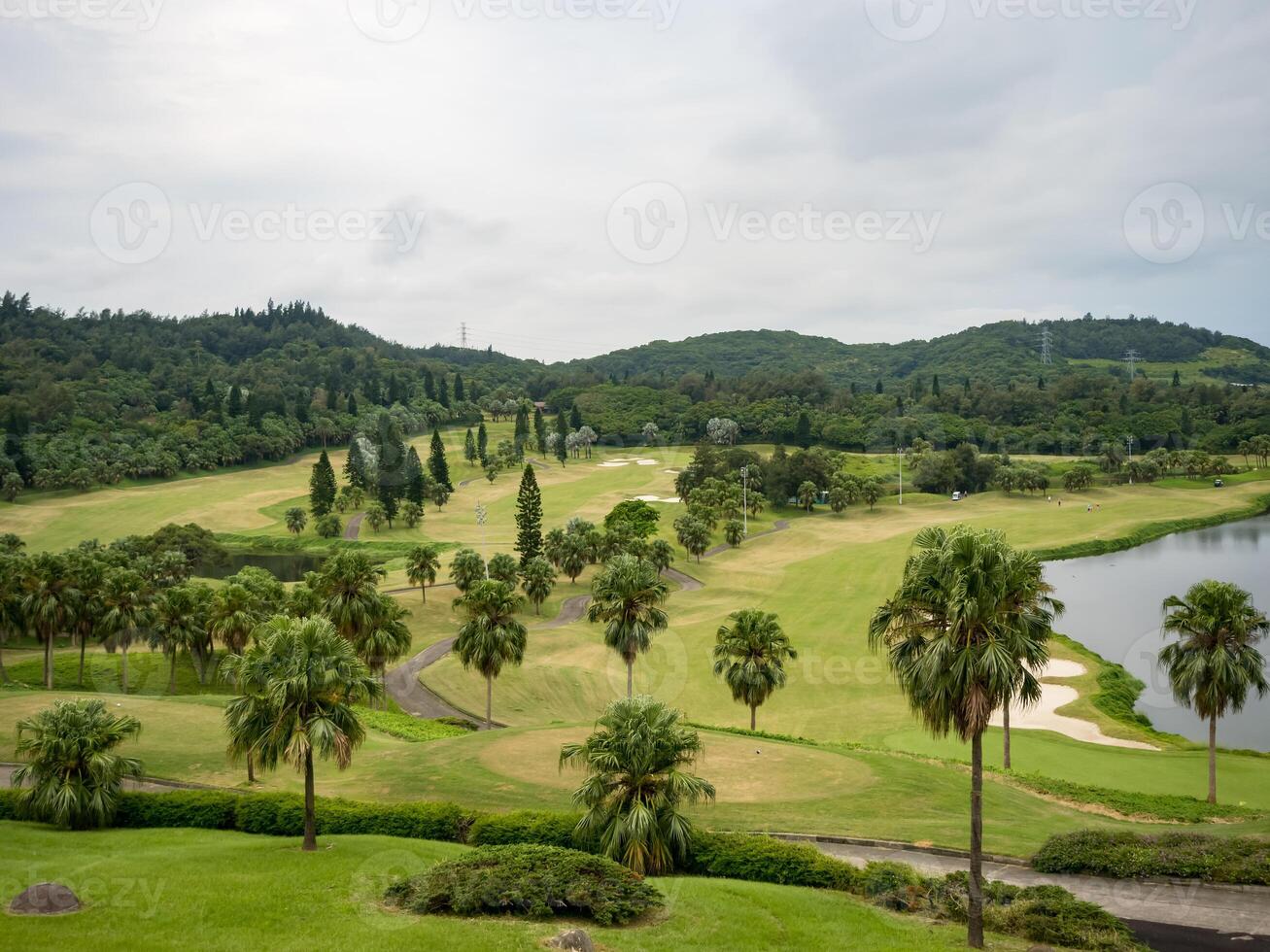 Golf course with gorgeous green and pond in Taiwan. photo