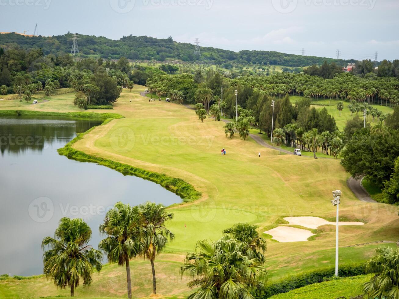 Golf course with gorgeous green and pond in Taiwan. photo