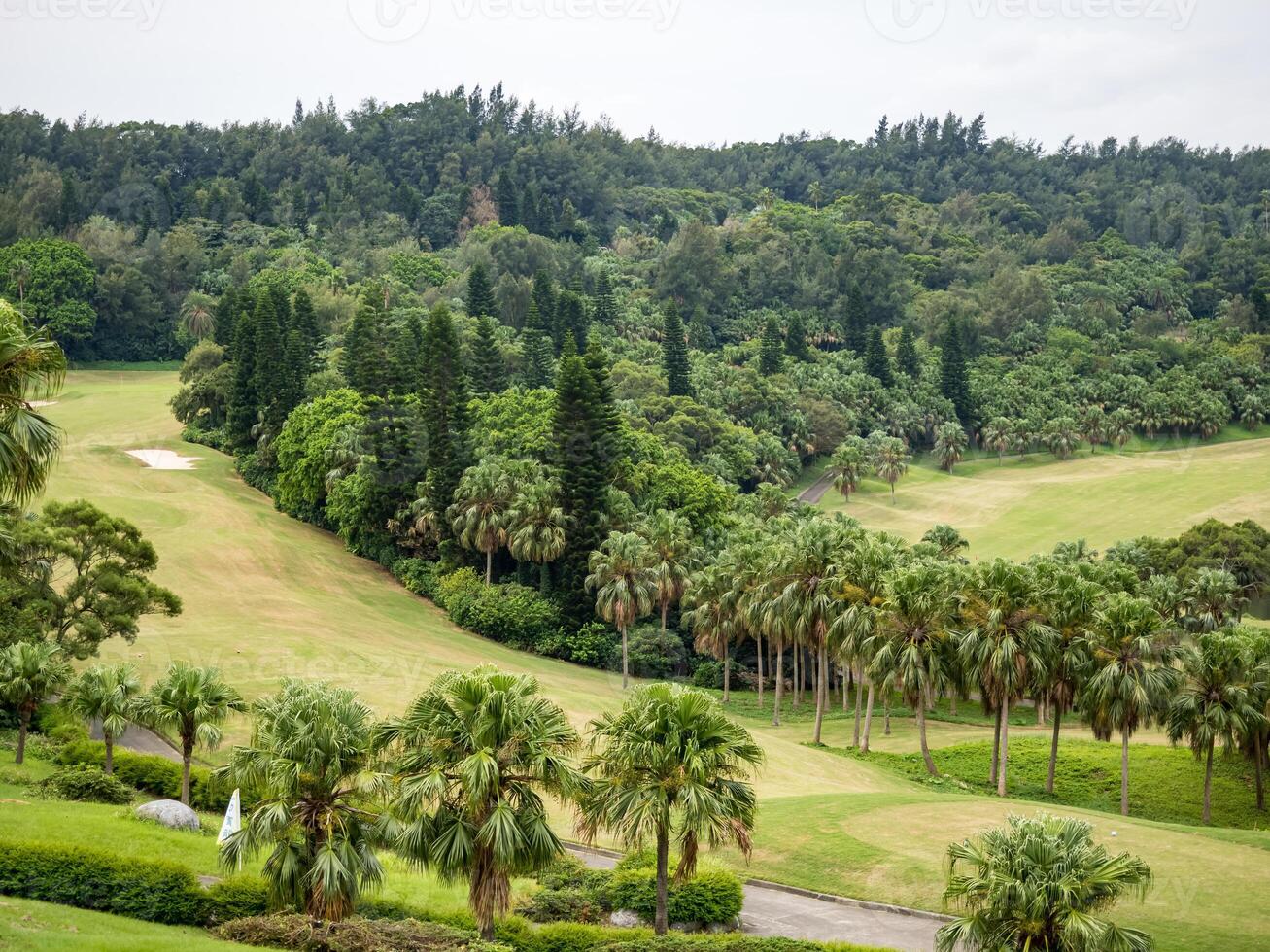 Golf course with gorgeous green and pond in Taiwan. photo