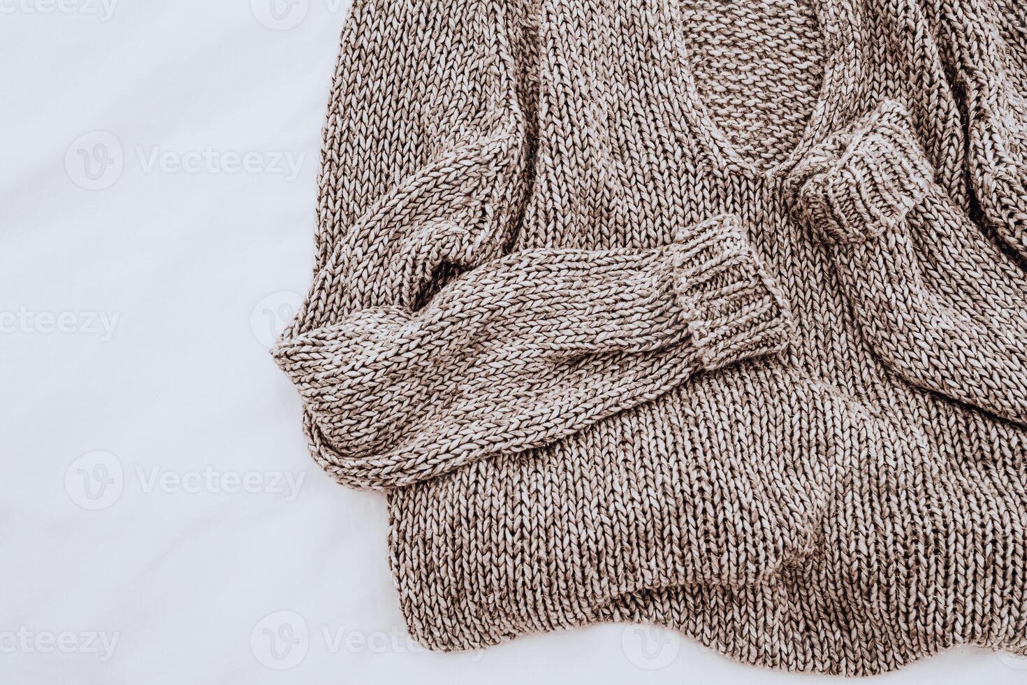 Warm Knitted Sweater Isolated on White photo