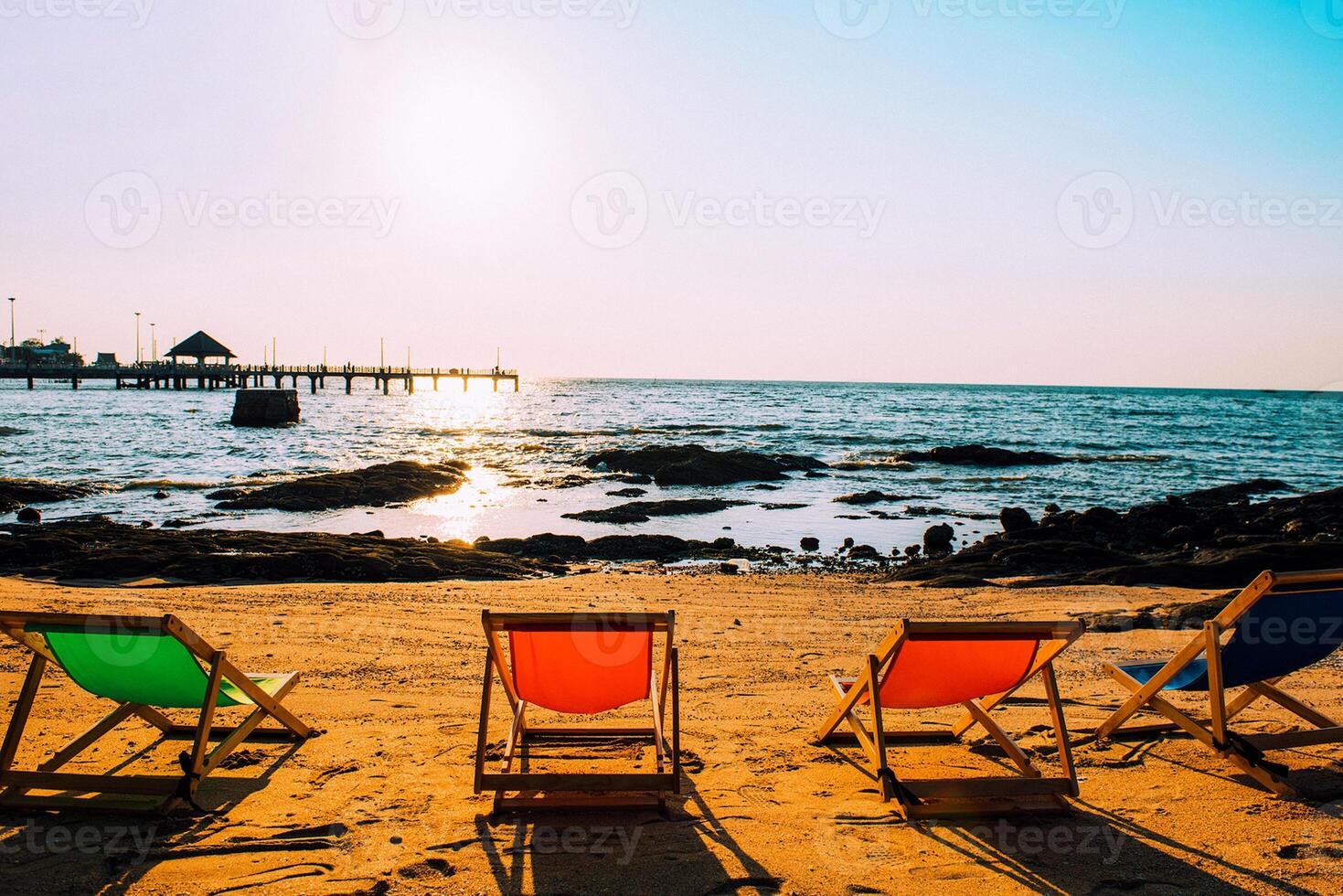 Beach and chairs on the sand by the sea in Bang Saen during summer vacation Sea tourism concept in Thailand. photo