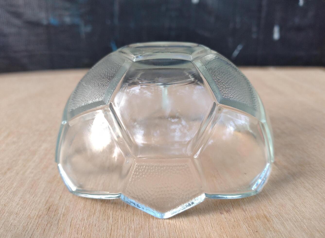 Glass vase on wooden table. Glass vase on wooden table. photo