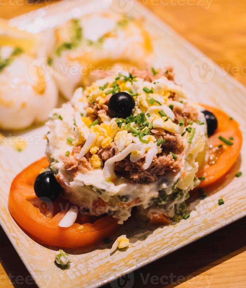 Portion of Russian salad with tuna photo