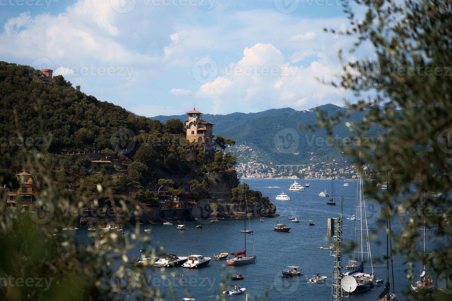 streets, bays and yachts on the charming coast of Portofino in northern Italy on a summer day photo