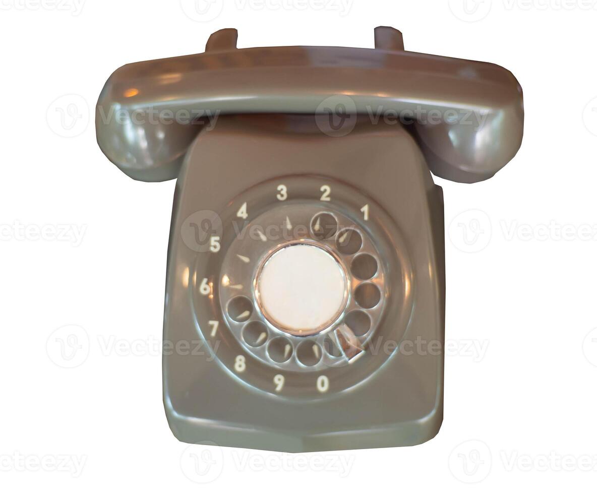 Isolated vintage rotary telephone on white bg photo